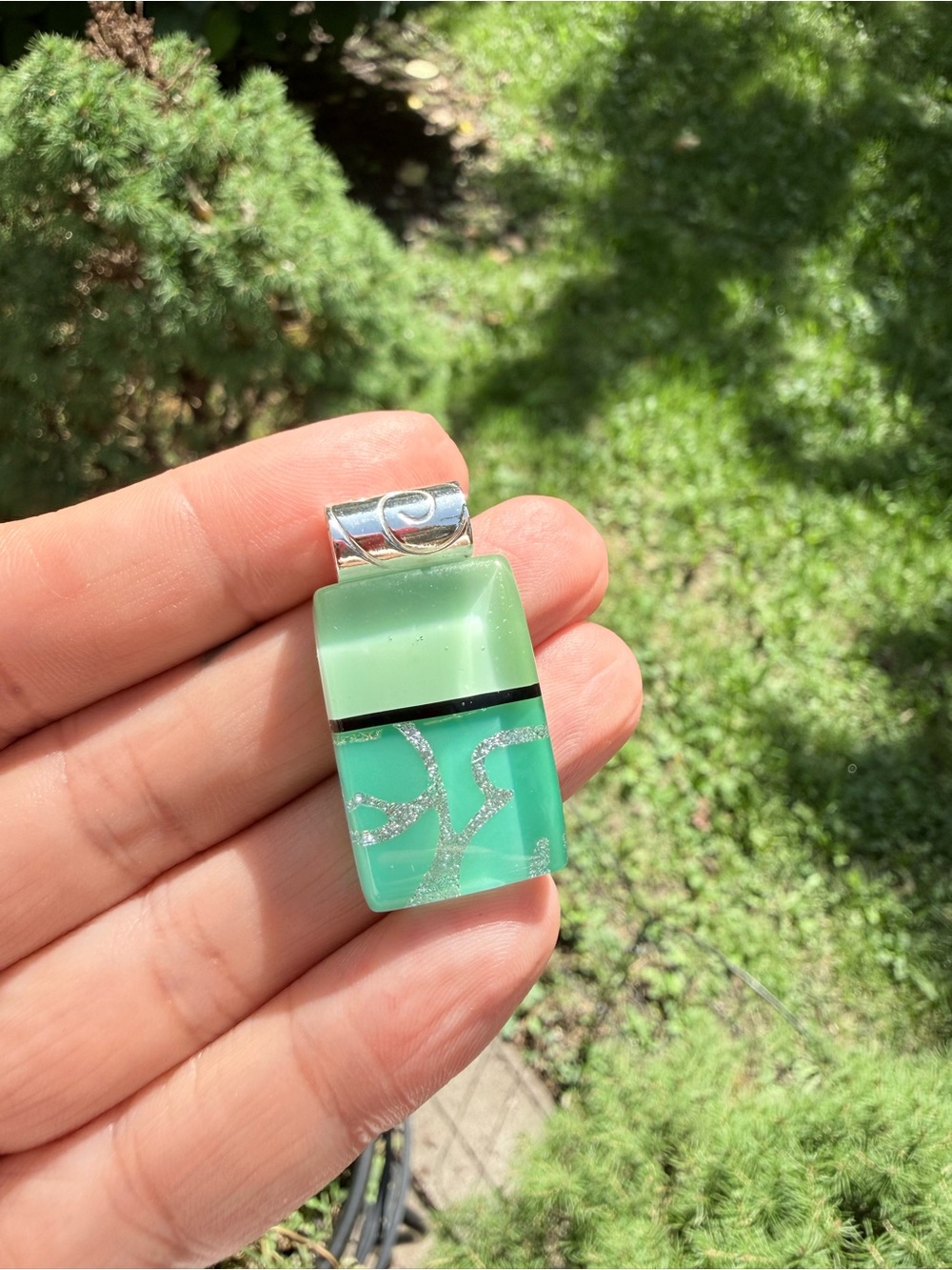 Artisan made sterling silver and glass pendant